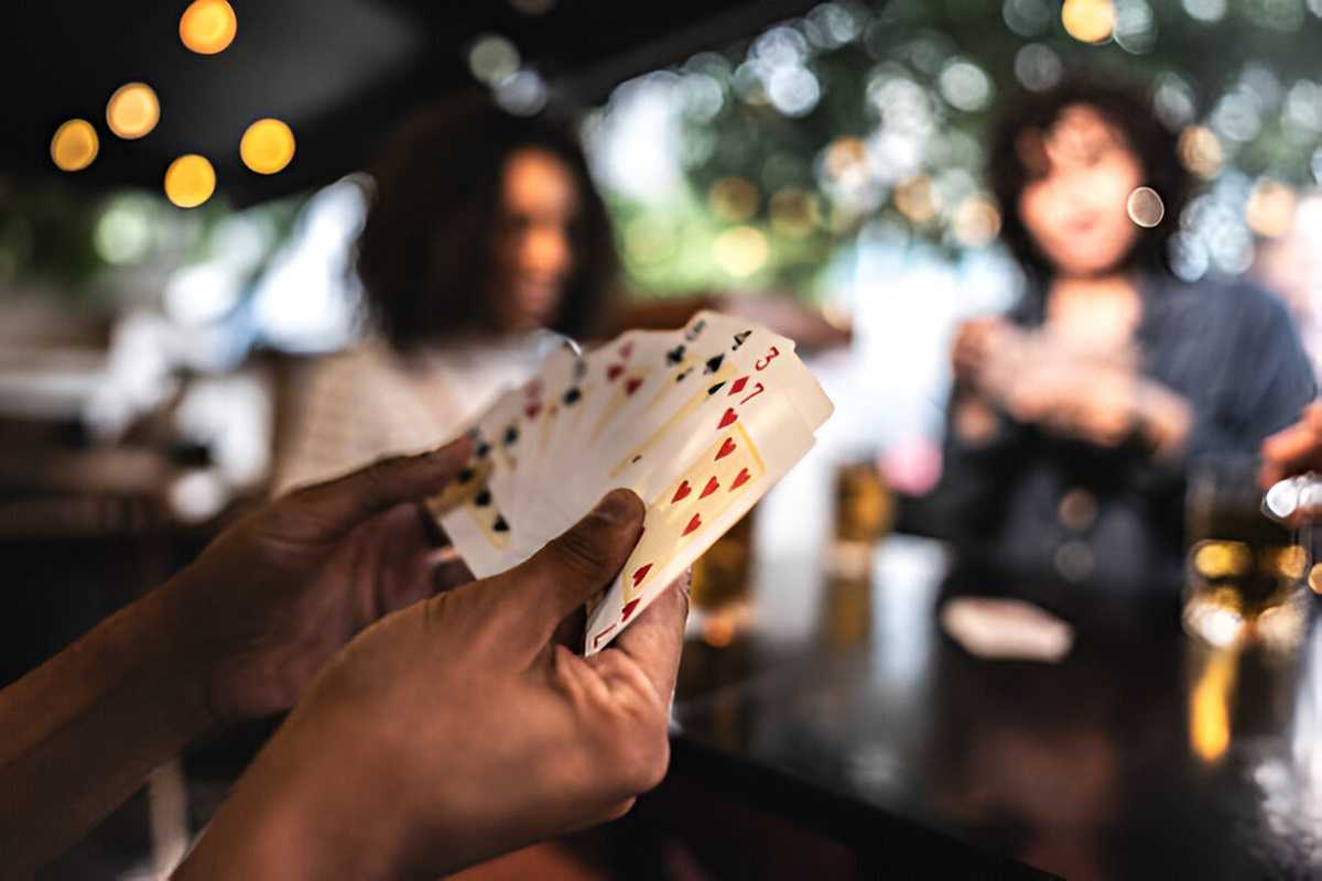 Two players competing in Crazy Eights.